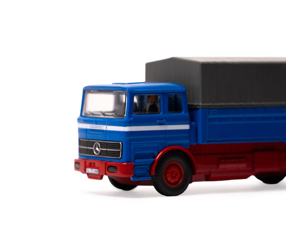 Véhicule 1:87 M-B 1620 plateau avec remorque orange 1/87 - Breizh Modélisme.