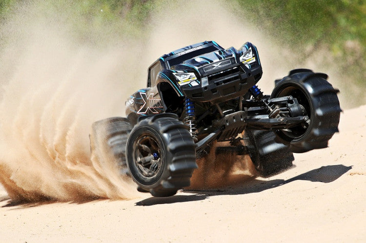 2 pneus et jantes Paddle Traxxas XMaxx 7773