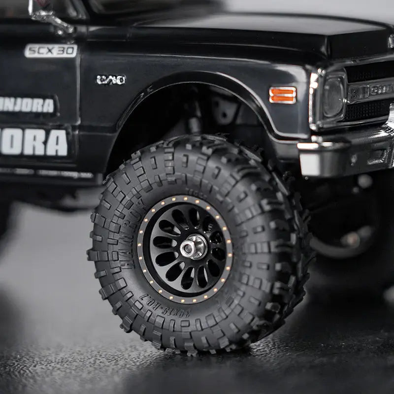 4 jantes en laiton noir ondulé Injora 0,7" D19 pour 1/30 SCX30 (W7005)