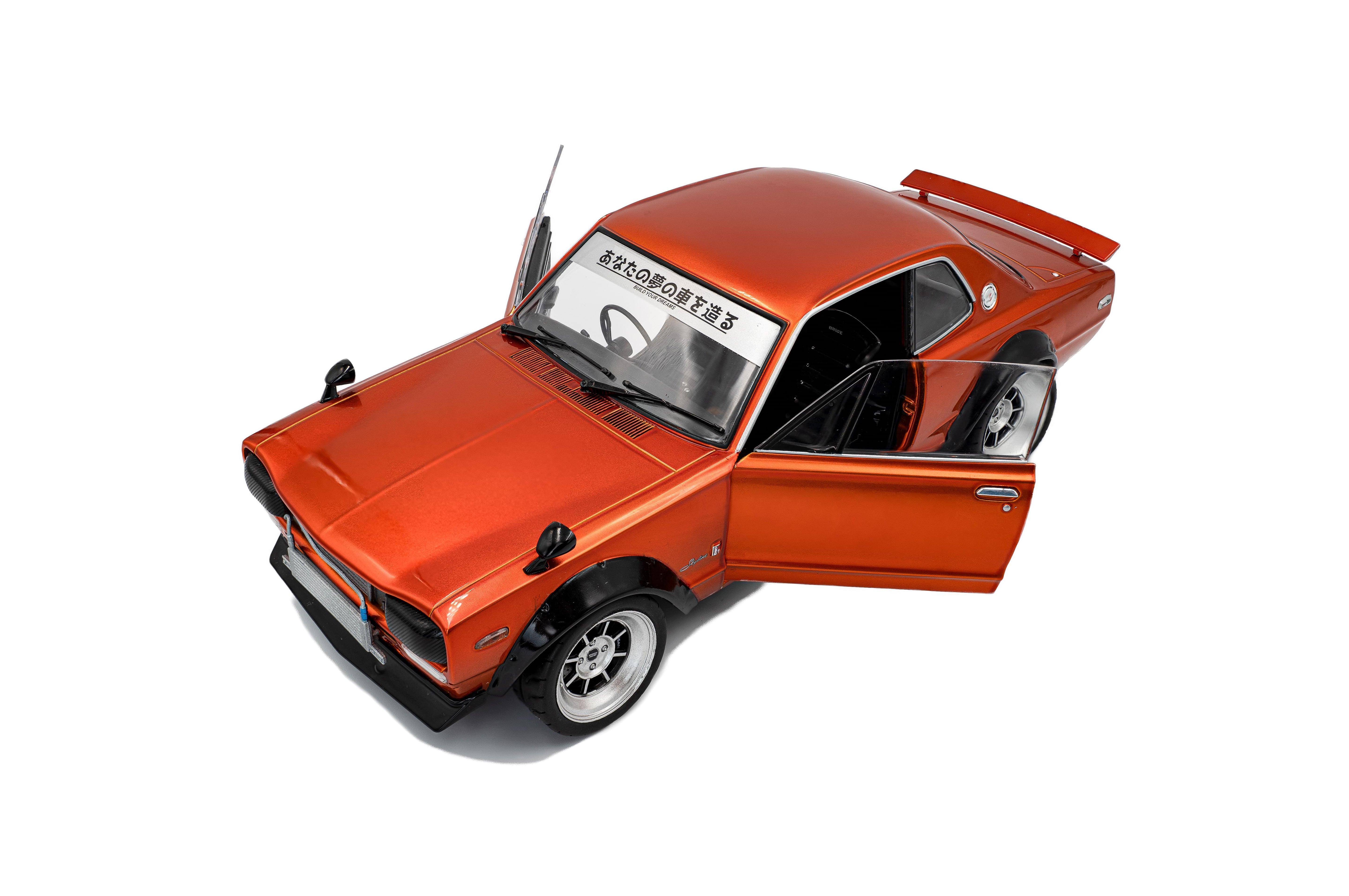 Solido S1813003 Voiture miniature collection 1/18 Nissan Skyline (C10) Hakosuka – orange metallic – 1970