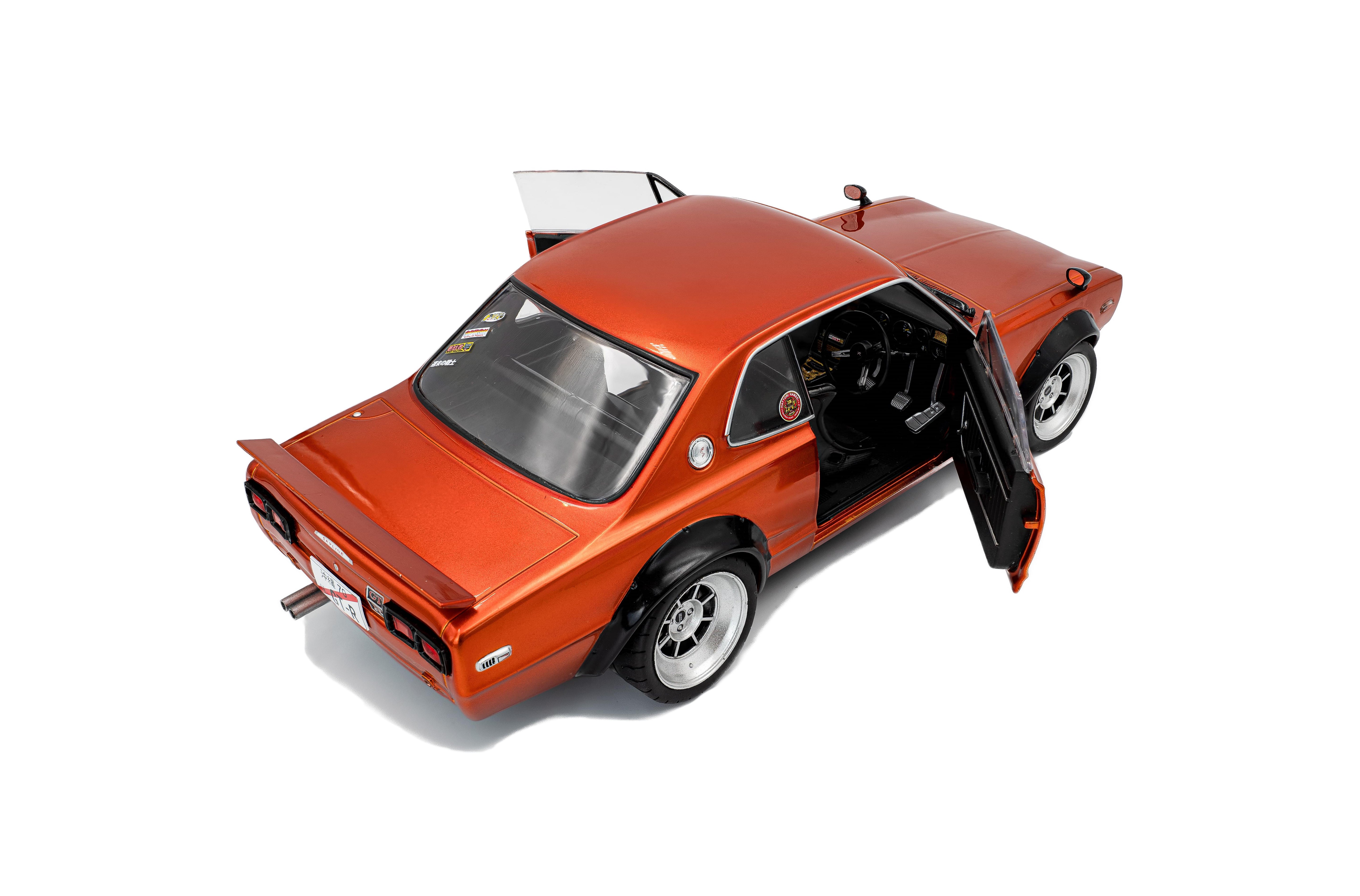Solido S1813003 Voiture miniature collection 1/18 Nissan Skyline (C10) Hakosuka – orange metallic – 1970