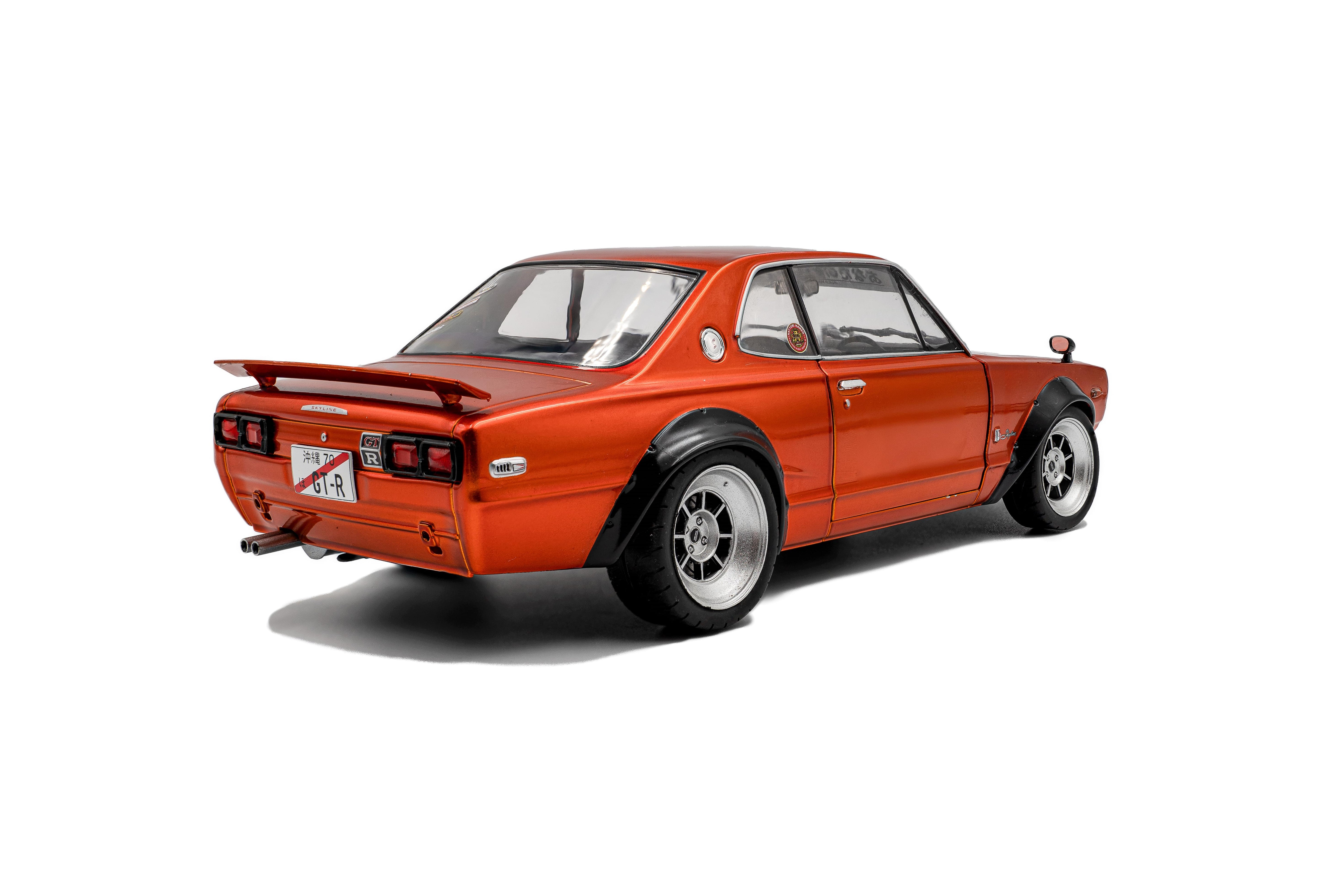 Solido S1813003 Voiture miniature collection 1/18 Nissan Skyline (C10) Hakosuka – orange metallic – 1970