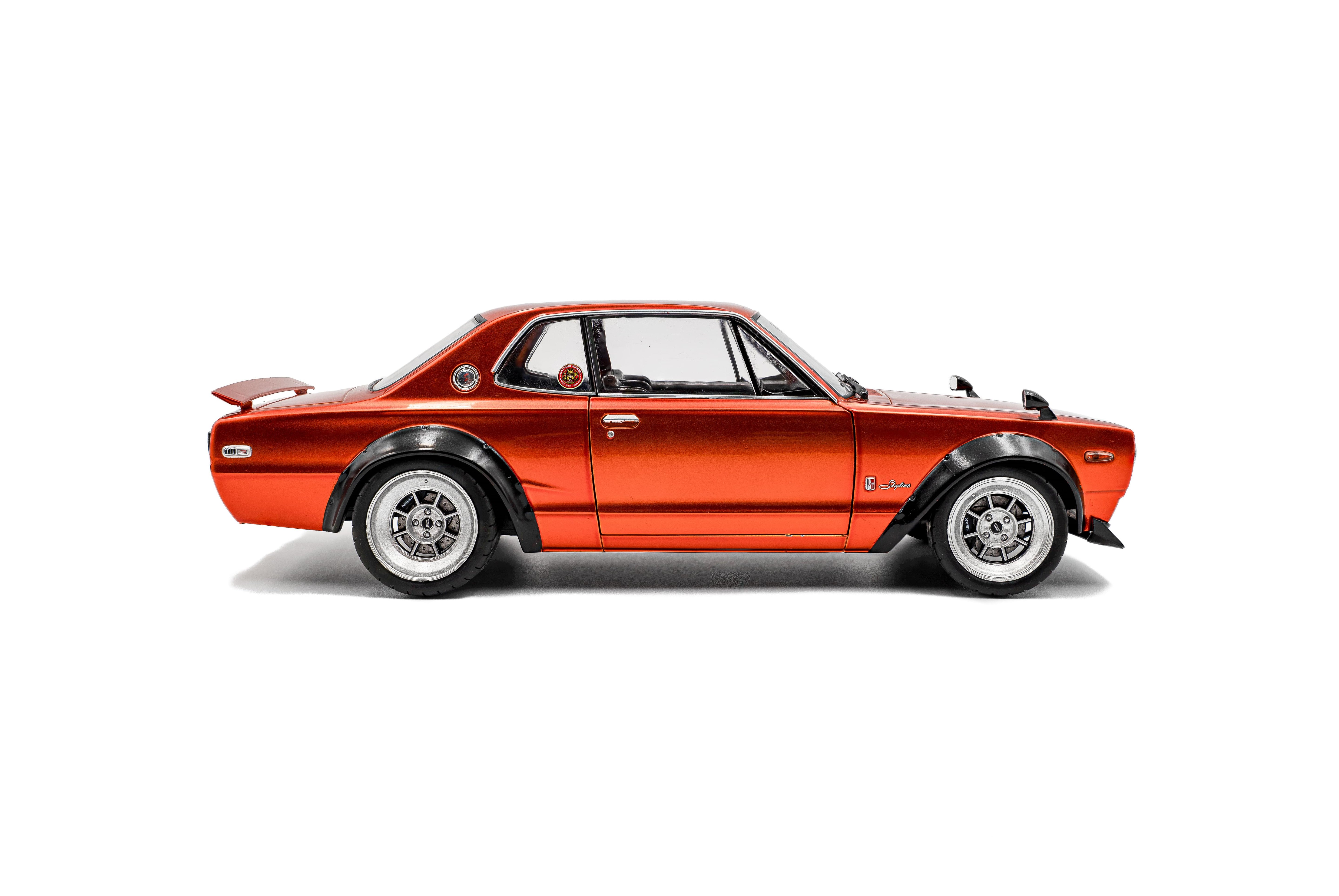 Solido S1813003 Voiture miniature collection 1/18 Nissan Skyline (C10) Hakosuka – orange metallic – 1970