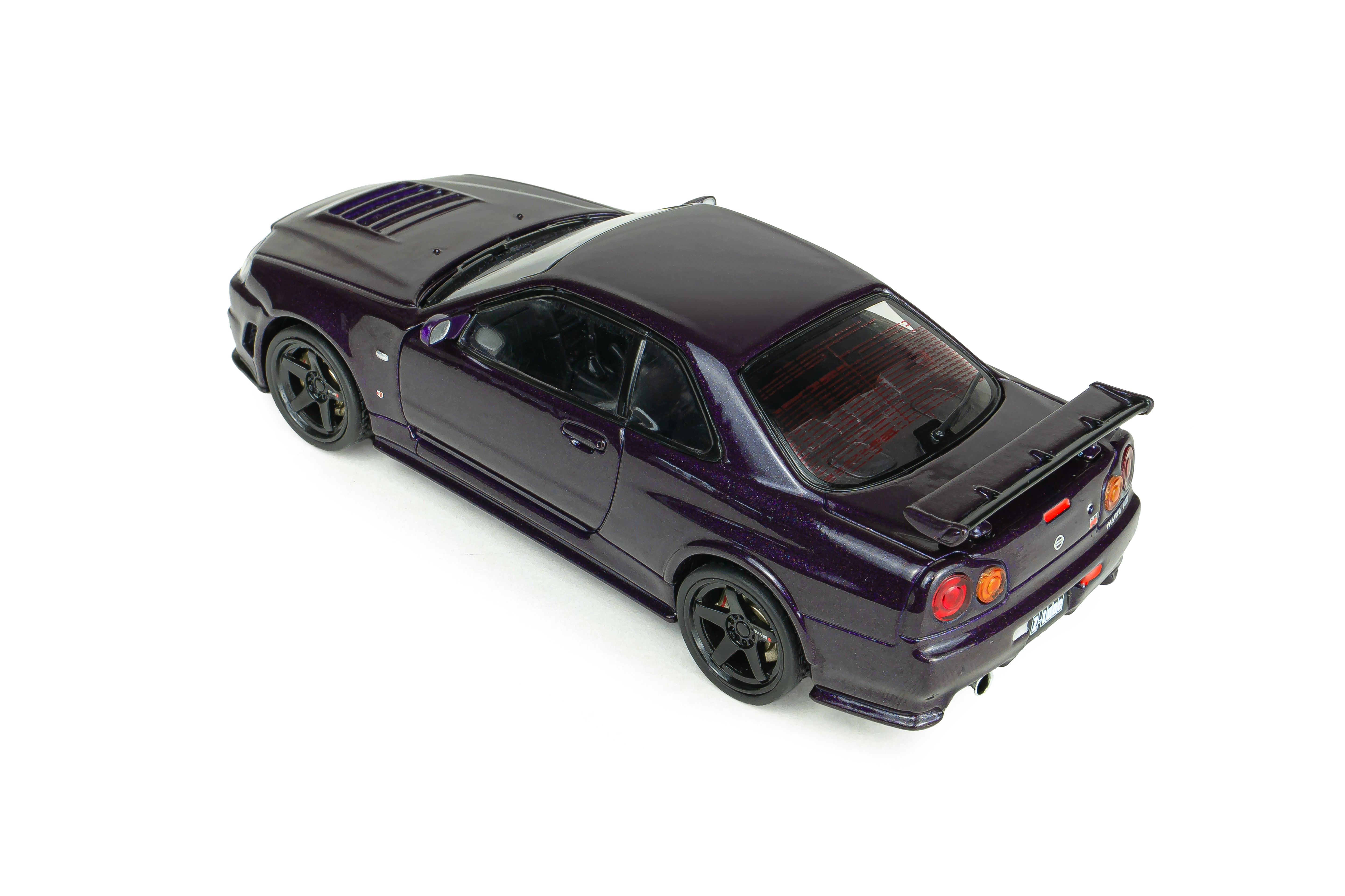 Voiture miniature 1/43 Nissan Skyline GT-R (R34) Z Tune 1999 Midnight Purple Solido S4318201