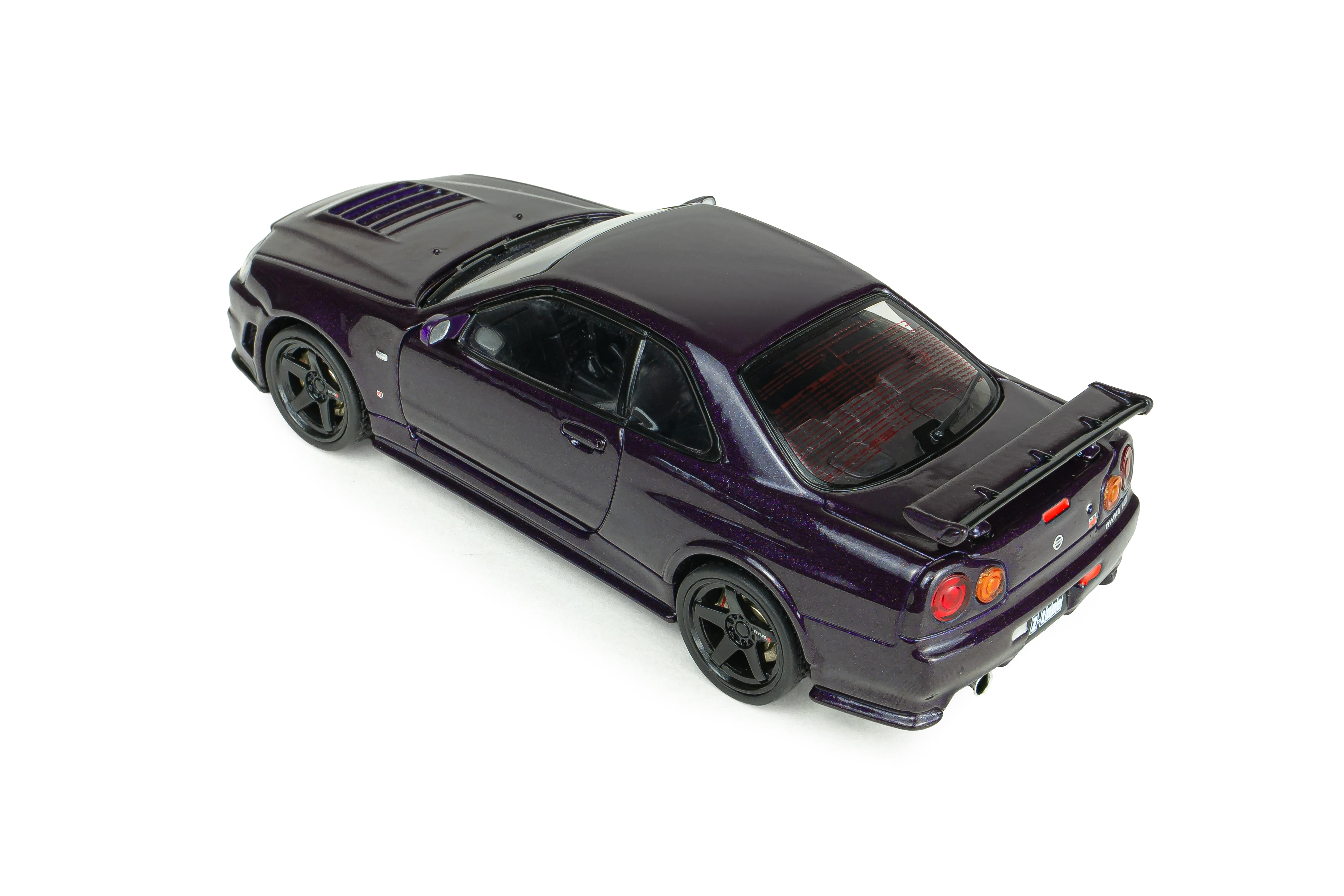 Voiture miniature 1/43 Nissan Skyline GT-R (R34) Z Tune 1999 Midnight Purple Solido S4318201