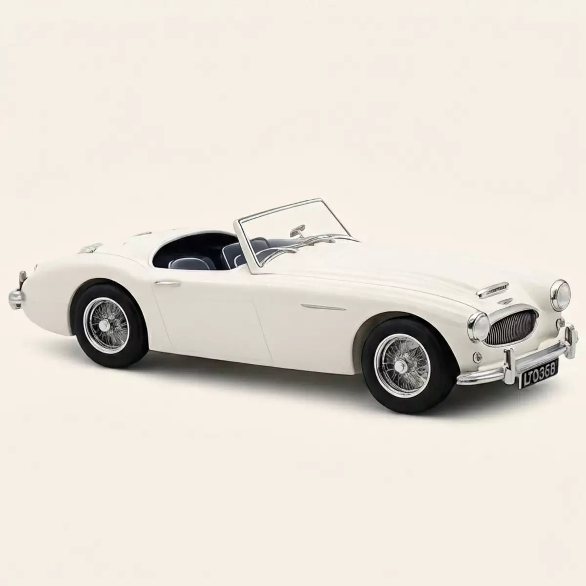 Voiture miniature collection 1/18 Austin Healey 3000 Mk.2 1961 Old English blanc Norev 182602